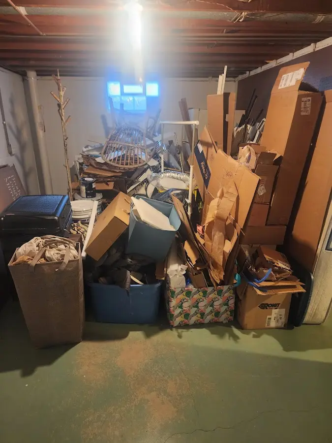 Roll-off dumpster container at job site for 20 Yard Dumpster Rental in McCalla